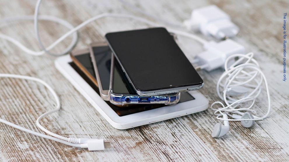 phones and headphones on a table