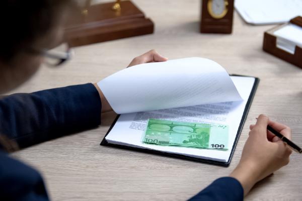 money hidden behind a page