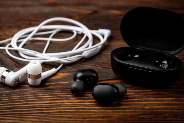 earphones on a wooden table