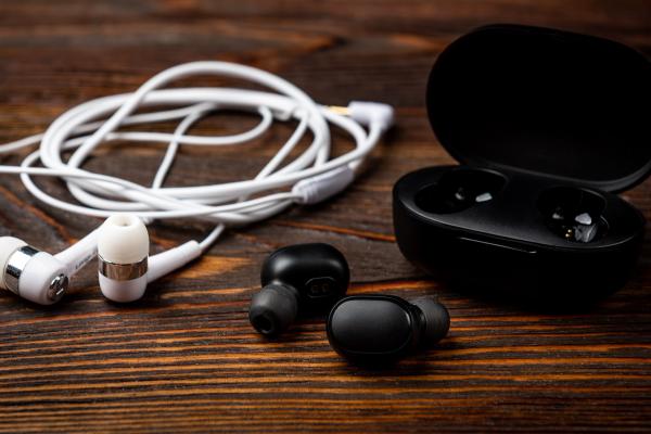 earphones on a wooden table
