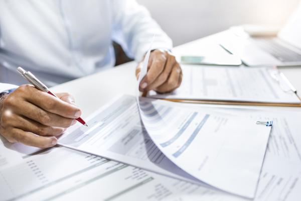 person filling in forms
